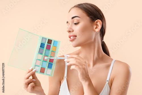 Young woman with decorative...