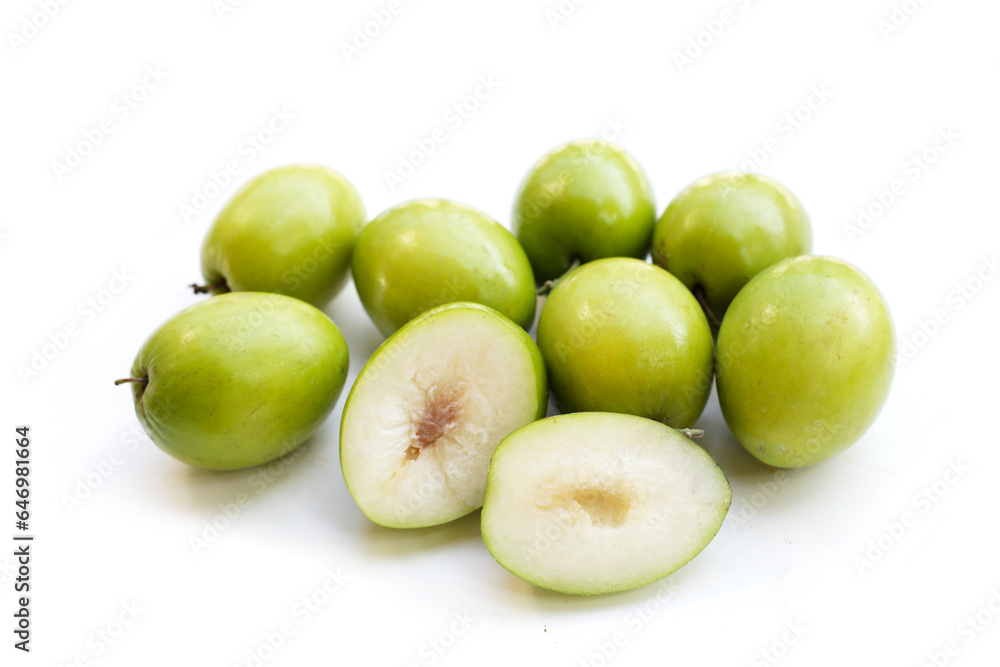 Green jujube fruits on white background. Green jujube fruits on white background.