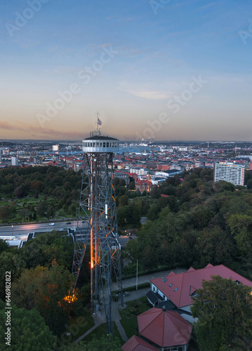 Obraz na płótnie Panoramic summer cityscape of Aalborg (North Jutland, Denmark) at sunset, with Aalborg Tower (Aalborgtårnet) in the foreground
w salonie