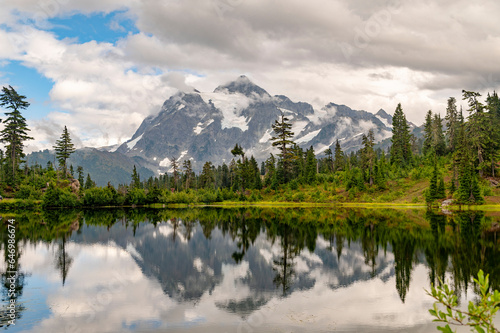 Picture Lake and Mt. Shuksan, Washington. Picture Lake is the centerpiece of a strikingly beautiful landscape in the Heather Meadows area of the Mt. Baker-Snoqualmie National Forest. © LoweStock