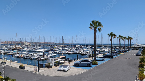 Beautiful seascape with yachts and promenade