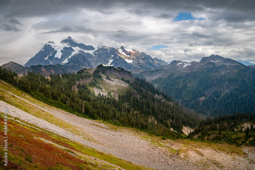 Panoramic View of the majestic Mt. Shuksan in the Cascade Mountain range. Shuksan is one of the most photographed mountains in the world for it's striking beauty and easy access. Washington state. Panoramic View of the majestic Mt. Shuksan in the Cascade Mountain range. Shuksan is one of the most photographed mountains in the world for it's striking beauty and easy access. Washington state.