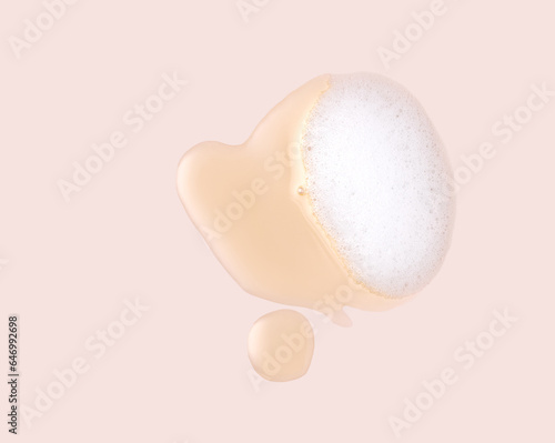 Fotografie Face care washing cleansing with foam and hydrophilic oil, cosmetics on a beige