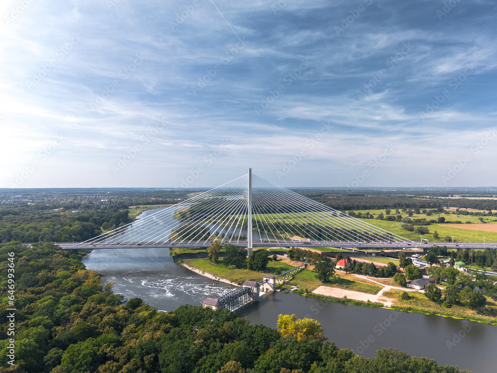 Aerial view of the cable-stayed Rędziński bridge (Most Rędziński) over Oder river in Pilczyce, Wrocław, Poland