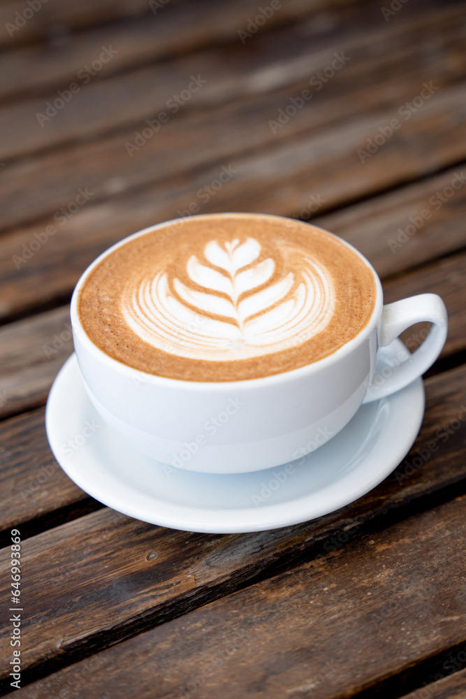 Cup of coffee latte in coffee shop Cup of coffee latte in coffee shop