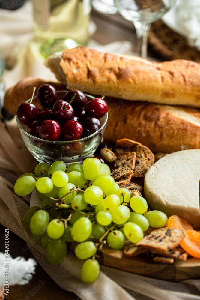 Cherries and grapes on a charcuterie board Cherries and grapes on a charcuterie board
