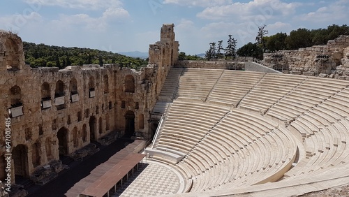 A symmetrical oval shape with tiered seating, a central arena, and surrounding arches and columns.