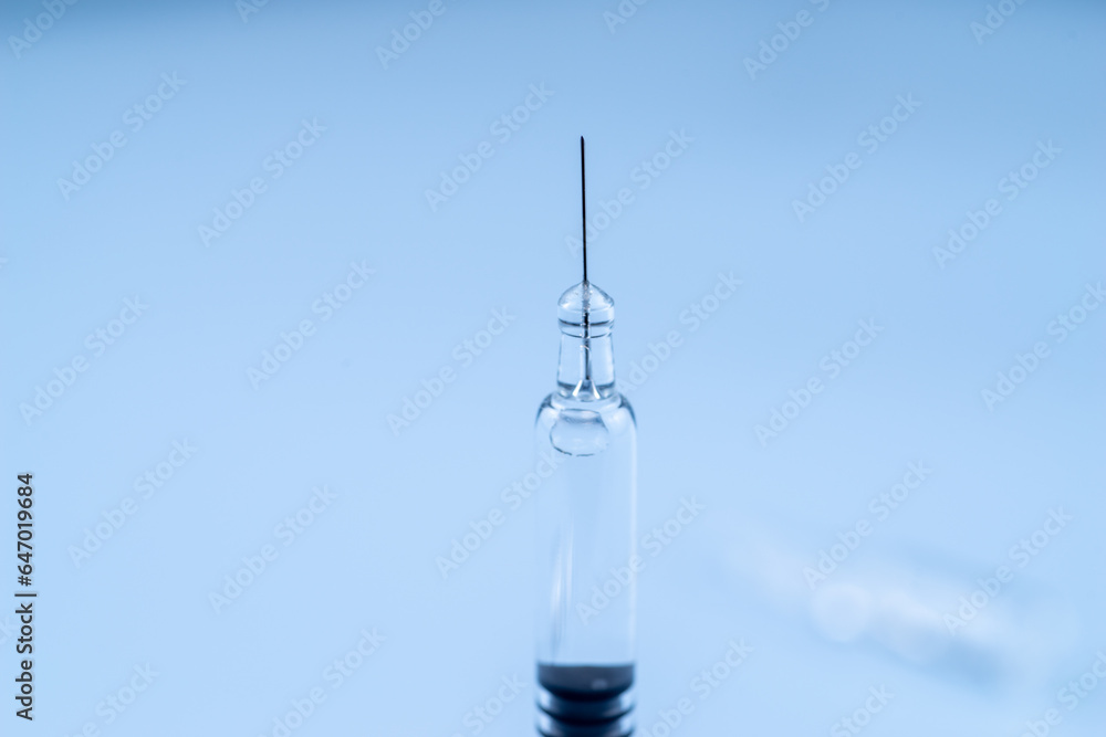 Ampoules filled with medicine and syringes Ampoules filled with medicine and syringes