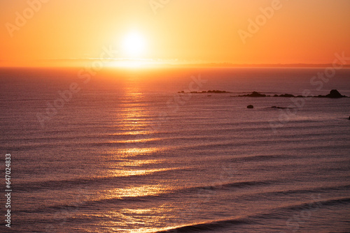 sunrise shining over the ocean