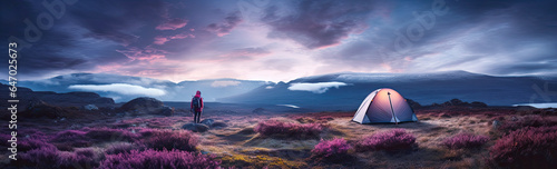 One person and Tourist tent in the mountains at sunset. created by generative AI technology.