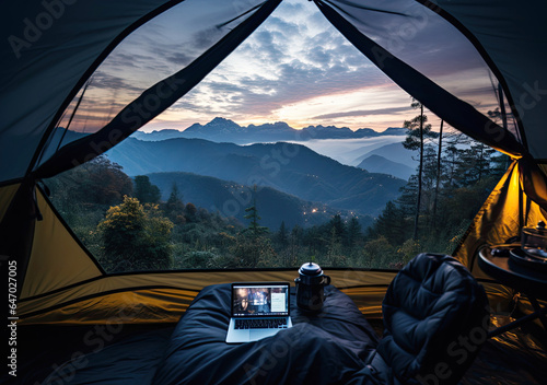 Camping in the mountains with a view of the beautiful landscape. created by generative AI technology.