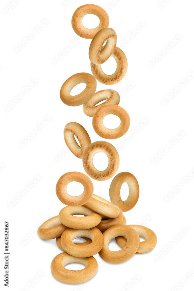 Fresh baked goods, bread rings falling from top to bottom (drying, dry bagels) isolated on transparent background. Fresh baked goods, bread rings falling from top to bottom (drying, dry bagels) isolated on transparent background.