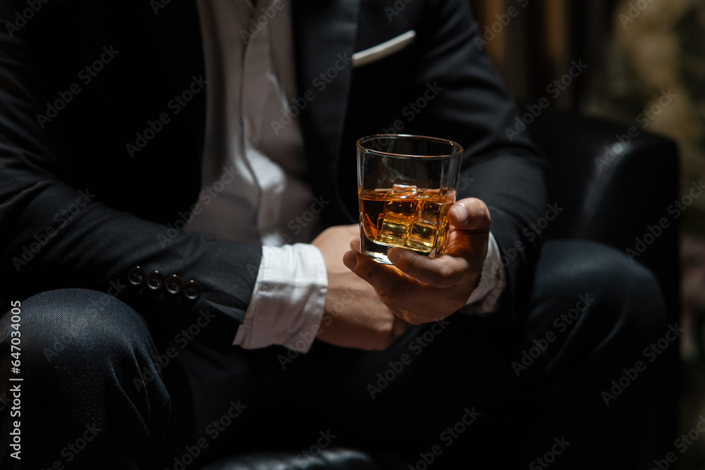 Businessmen in suits drinking Celebrate whiskey. Businessmen in suits drinking Celebrate whiskey.
