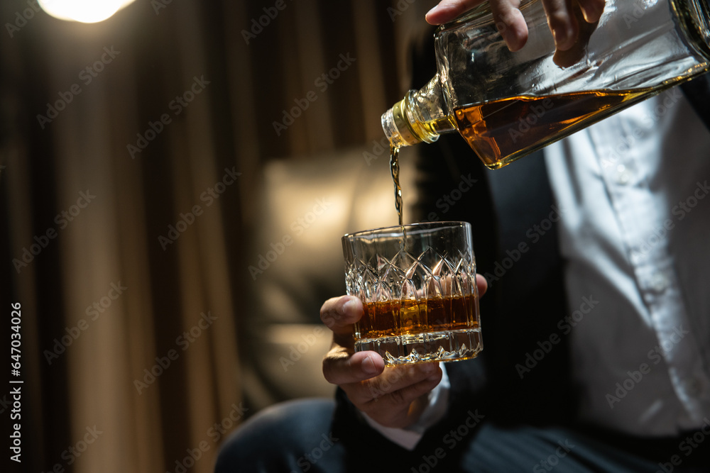 Businessmen in suits drinking Celebrate whiskey. Businessmen in suits drinking Celebrate whiskey.