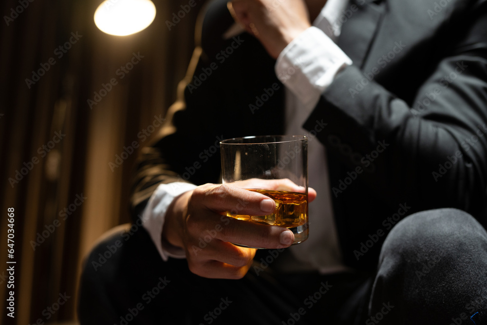 Businessmen in suits drinking Celebrate whiskey. Businessmen in suits drinking Celebrate whiskey.