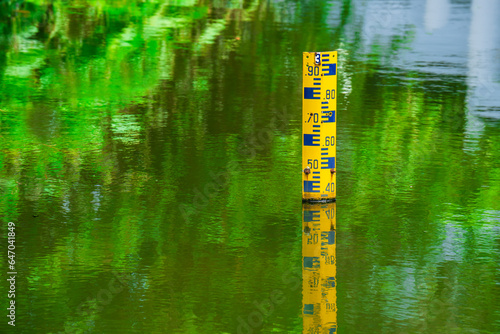 Water level depth meter, gauge, Concepts for natural resources. Water level gauges, selective focus, soft focus.
