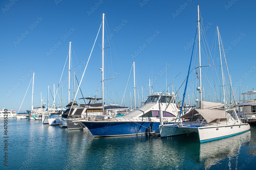 Yachts or boats on a sunny morning in a marina in La Paz Baja California Sur. Mexico. With clear blue summer sky