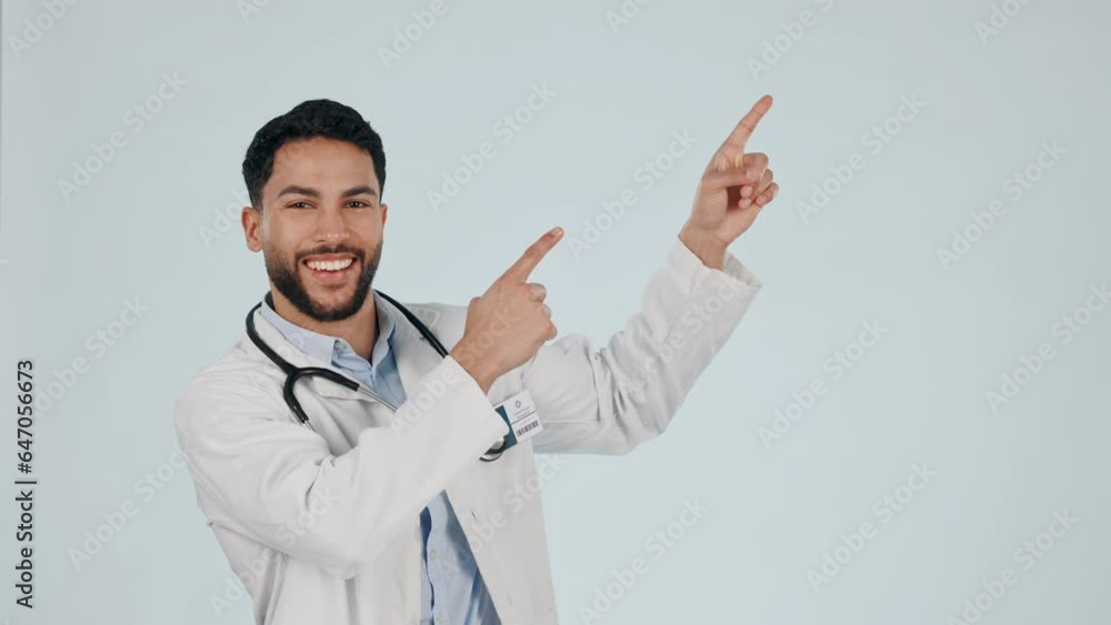 Pointing finger, doctor man and portrait in studio with mockup space, advertising and excited review. Happy male healthcare worker on grey background for presentation announcement, banner and hand Pointing finger, doctor man and portrait in studio with mockup space, advertising and excited review. Happy male healthcare worker on grey background for presentation announcement, banner and hand