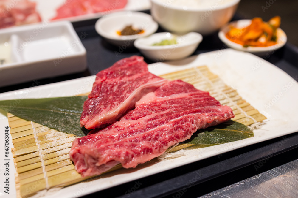 Slice of the raw beef in yakiniku restaurant