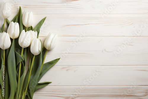 White tulips isolated on white wooden background #647064603