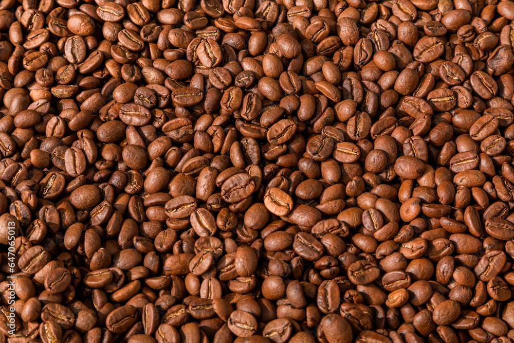 Coffee beans background. Space for text. Wallpaper. Surface. Making Coffee. Coffee shop. Caffeine. Coffee beans background. Space for text. Wallpaper. Surface. Making Coffee. Coffee shop. Caffeine.