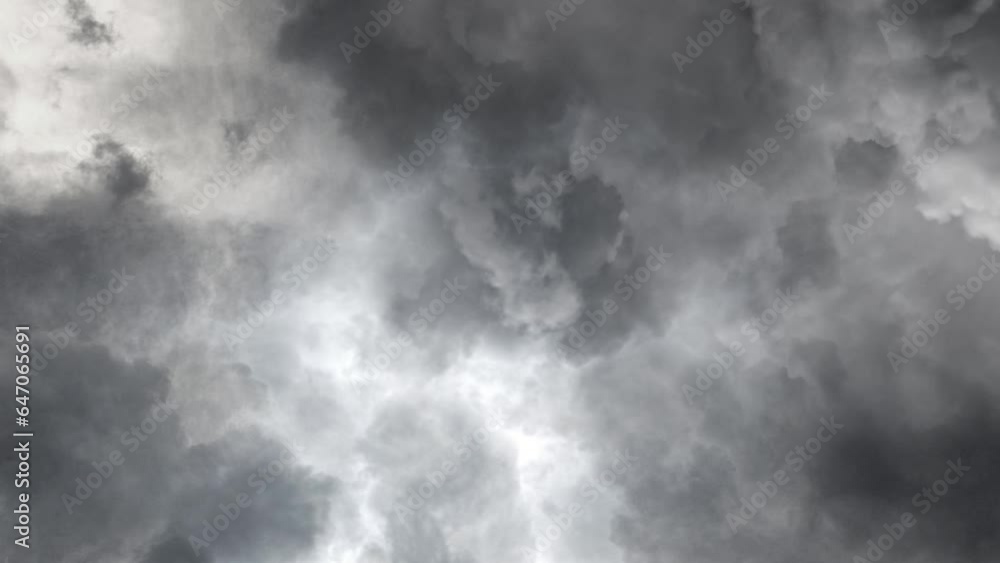 flying towards cumulonimbus clouds in the dark sky. flying towards cumulonimbus clouds in the dark sky.