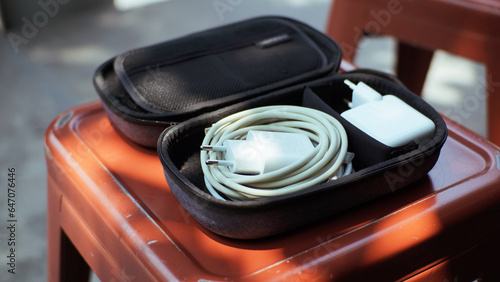 Modern bag for professional storage of cables, charging equipment or electronic equipment during trip or travel.