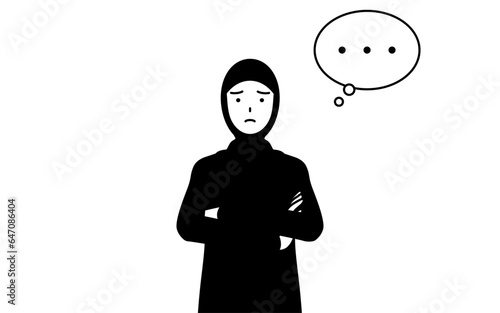 腕を組んで考えるイスラムの女性