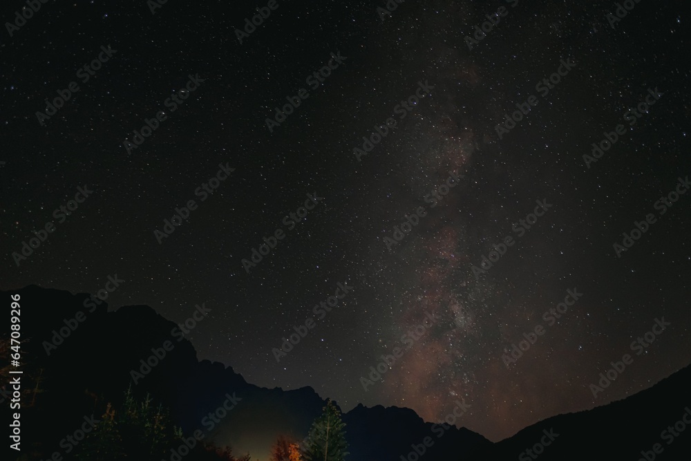 Night landscape with colorful Milky Way at mountain.
