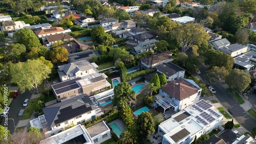 Sydney, Australia: Aerial drone footage of an upscale residential district with many houses with swimming pools of Bellevue Hill close to Rose Bay in Sydney.  photo