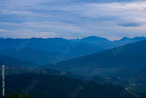 Mountain green valley and cloudy rainy sky.Pasture in mountain valley, Mountain landscape, Natural background