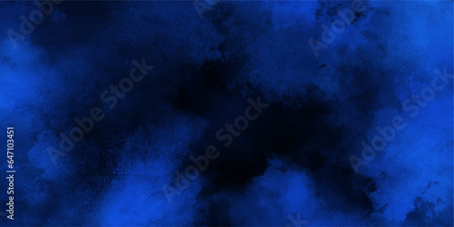 Blue smoke in dark background.Texture and desktop picture. blue texture with colorful smoke, decorative and blurry and grunge blue paper texture, Colorful blue textures for making flyer and poster. 