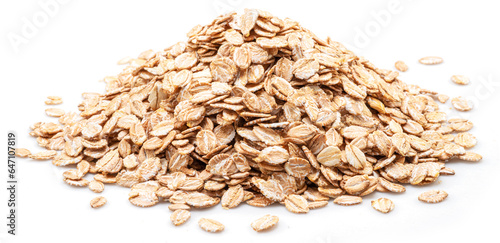 Pile of wheat flakes isolated on white background. photo