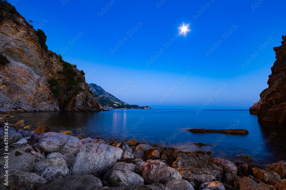 seascape at night, sea, moon and rocky shore, beautiful seaside resort, beach, adriatic sea, summer vacation