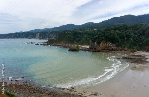 Cadavedo or La Ribeirona beach. It is shaped like a shell 400 meters long, and can exceed 50,000 square meters of beach space at low tide. Asturias, Spain.