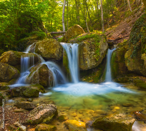 Fototapeta Naklejka Na Ścianę i Meble -  small beautiful waterfall on mountain river