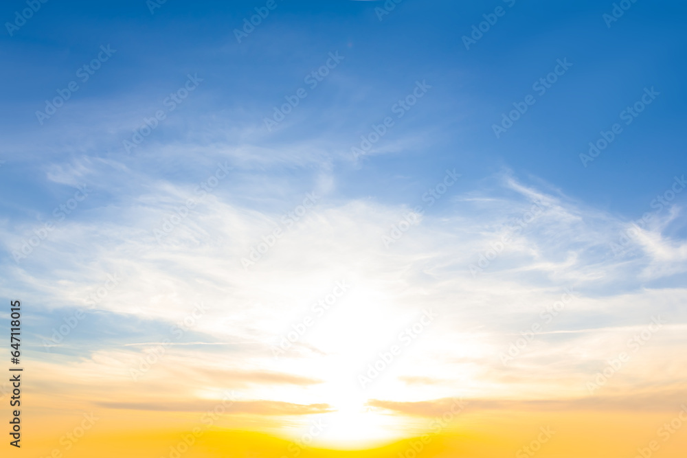 Obraz premium dramatic sunset on blue cloudy sky background