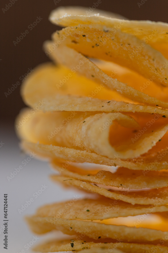 Potato chips on a light background Potato chips on a light background