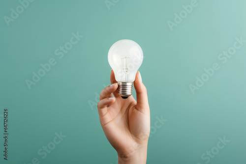 Hand Holding a Lightbulb - Idea and Innovation - Electricity and Technology - AI Generated