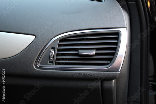 Close up car ventilation system and air conditioning - details and controls of modern car. Car air conditioner, interior of a new modern car. © Best Auto Photo
