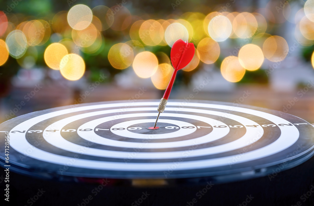 Fototapeta premium Bullseye is a target of business. Dart is an opportunity and Dartboard is the target and goal. So both of that represent a challenge in business marketing as concept.
