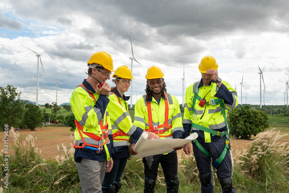 Engineering people are meeting at electrical turbines field, Engineering people, corporate working, teamwork concept Engineering people are meeting at electrical turbines field, Engineering people, corporate working, teamwork concept