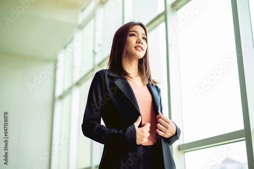 happy smile of young business women who have achieved success from working on personal business, feeling good, hoping and progressing in work and business Free Download happy smile of young business women who have achieved success from working on personal business, feeling good, hoping and progressing in work and business - GFXLoad