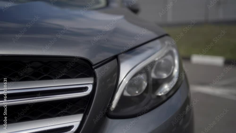 Slow motion view of Сar headlight. Front light automobile, close-up. Slow motion view of Сar headlight. Front light automobile, close-up.