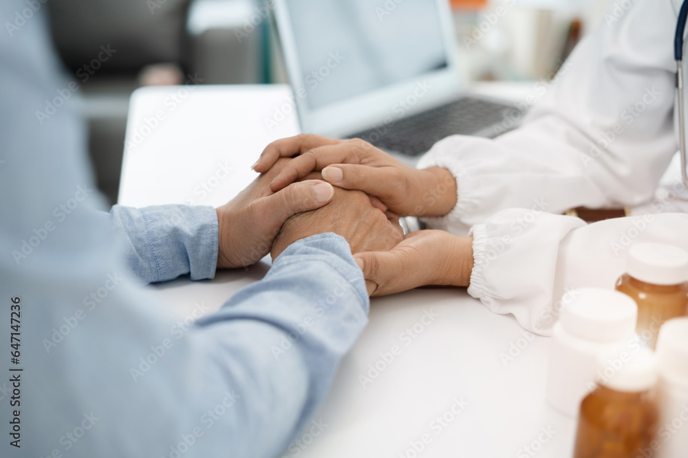 Female doctors shake hands with patients encouraging each other To offer love, concern, and encouragement while checking the patient's health. concept of medicine. Female doctors shake hands with patients encouraging each other To offer love, concern, and encouragement while checking the patient's health. concept of medicine.