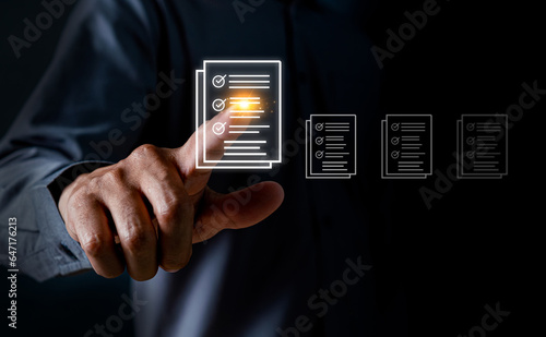 Businessman hand tick check and approve concepts. Document management, paperless. mark documents for online approve paperless quality assurance and ERP management. right and wrong document concept.