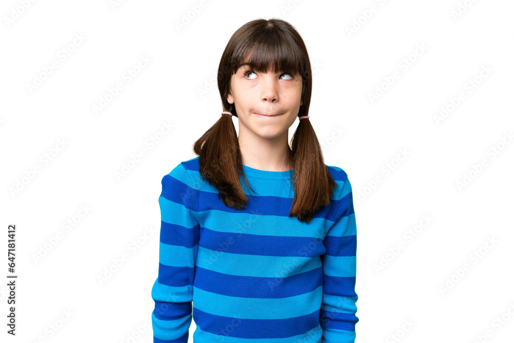 Little caucasian girl over isolated background having doubts while looking up