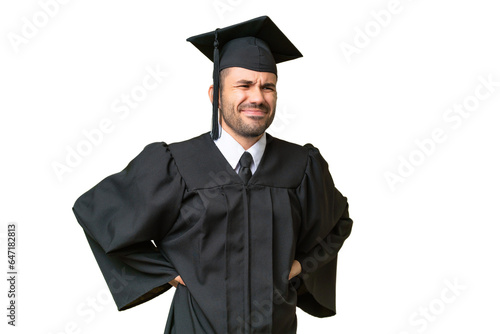 Young university graduate man over isolated background suffering from backache for having made an effort