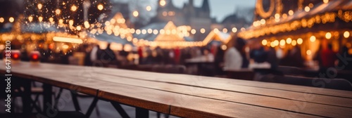 Empty table and blur Christmas market bokeh lights background, template