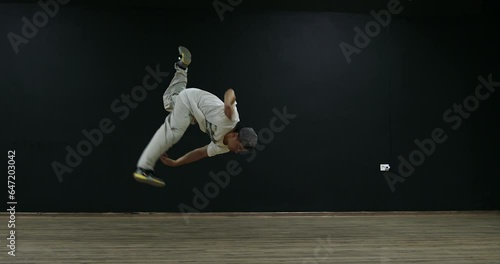 Super slow motion free running acrobat in the gym shot on 300fps 4K